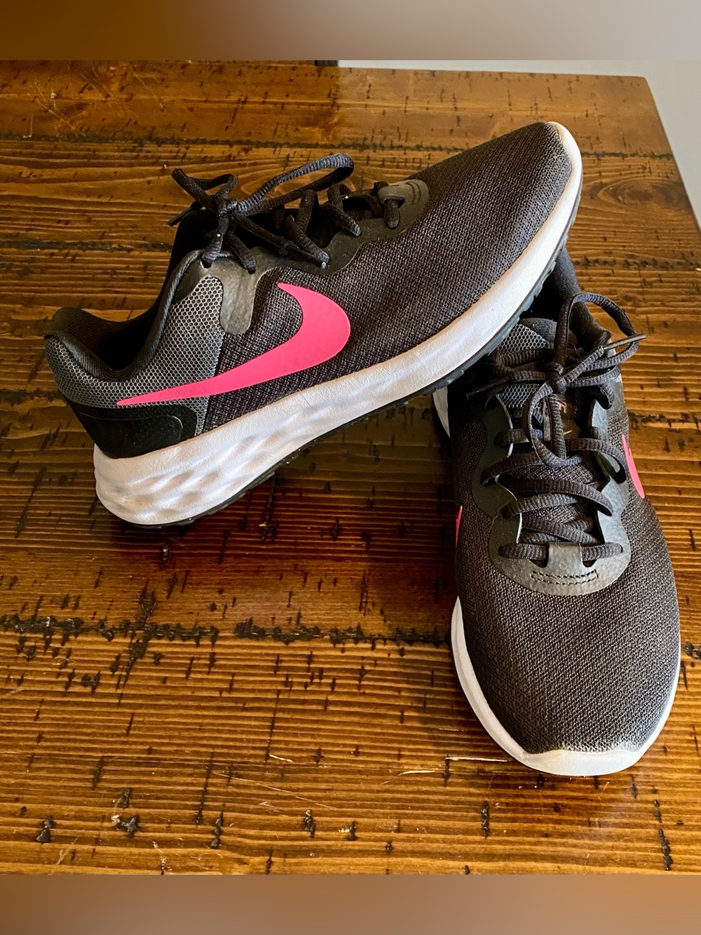 Nike Women’s Black Athletic Running Sneakers with Pink Swoosh